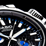 **Prompt 1: Sophisticated Design & Craftsmanship**
    A close-up, high-detail macro shot of a Casio Edifice watch, elegantly positioned on a wrist. Focus on the intricate, multi-layered dial with its delicate finish, sharp indices, and meticulously crafted hands. Dynamic studio lighting accentuates the interplay of light and shadow on the polished and brushed stainless steel case and bracelet, highlighting the exquisite texture and luxurious feel. The background is softly blurred, suggesting a refined, professional, and slightly futuristic environment, emphasizing the watch's sophisticated design and precision.