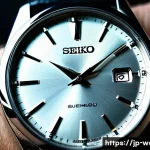 세이코 시계의 기술적 진화 - A close-up shot of a luxurious Seiko Spring Drive wristwatch on a sleek black leather strap, showcas...